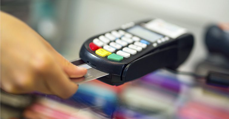 Paying for a purchase using a credit card reader