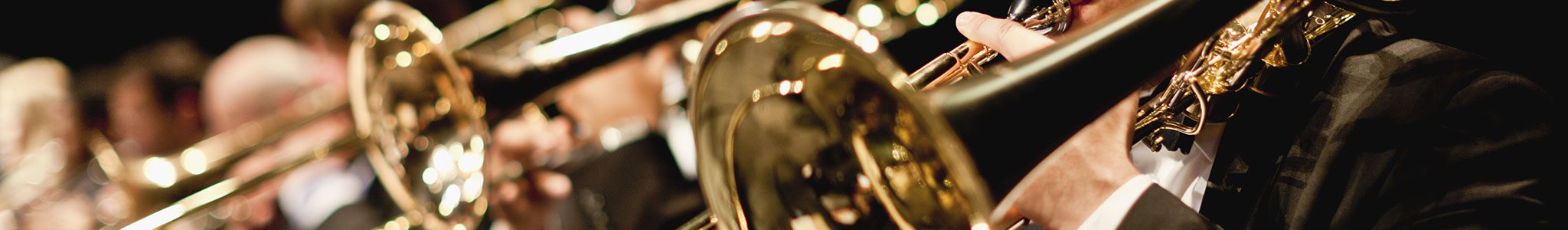 Trombone players in band concert