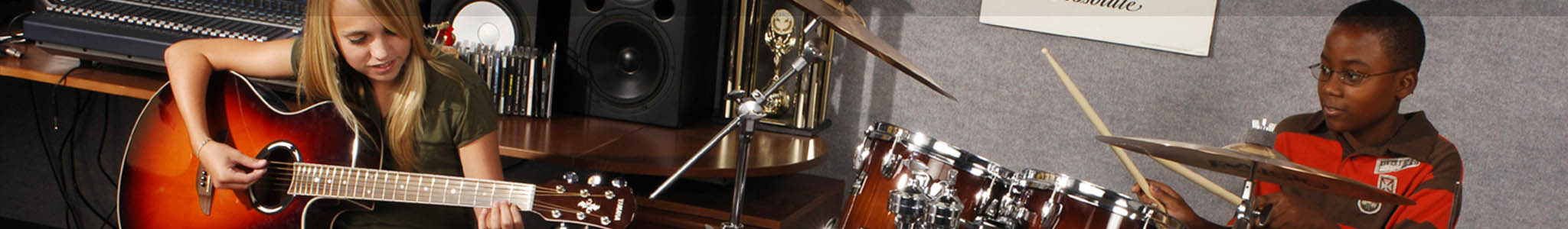 two kids playing in a band together