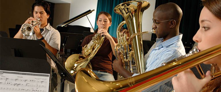 Brass Instruments Group of band students playing together