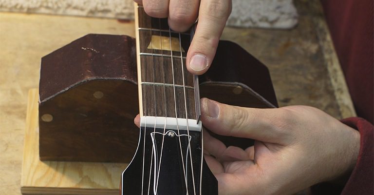 Guitar repair with tools